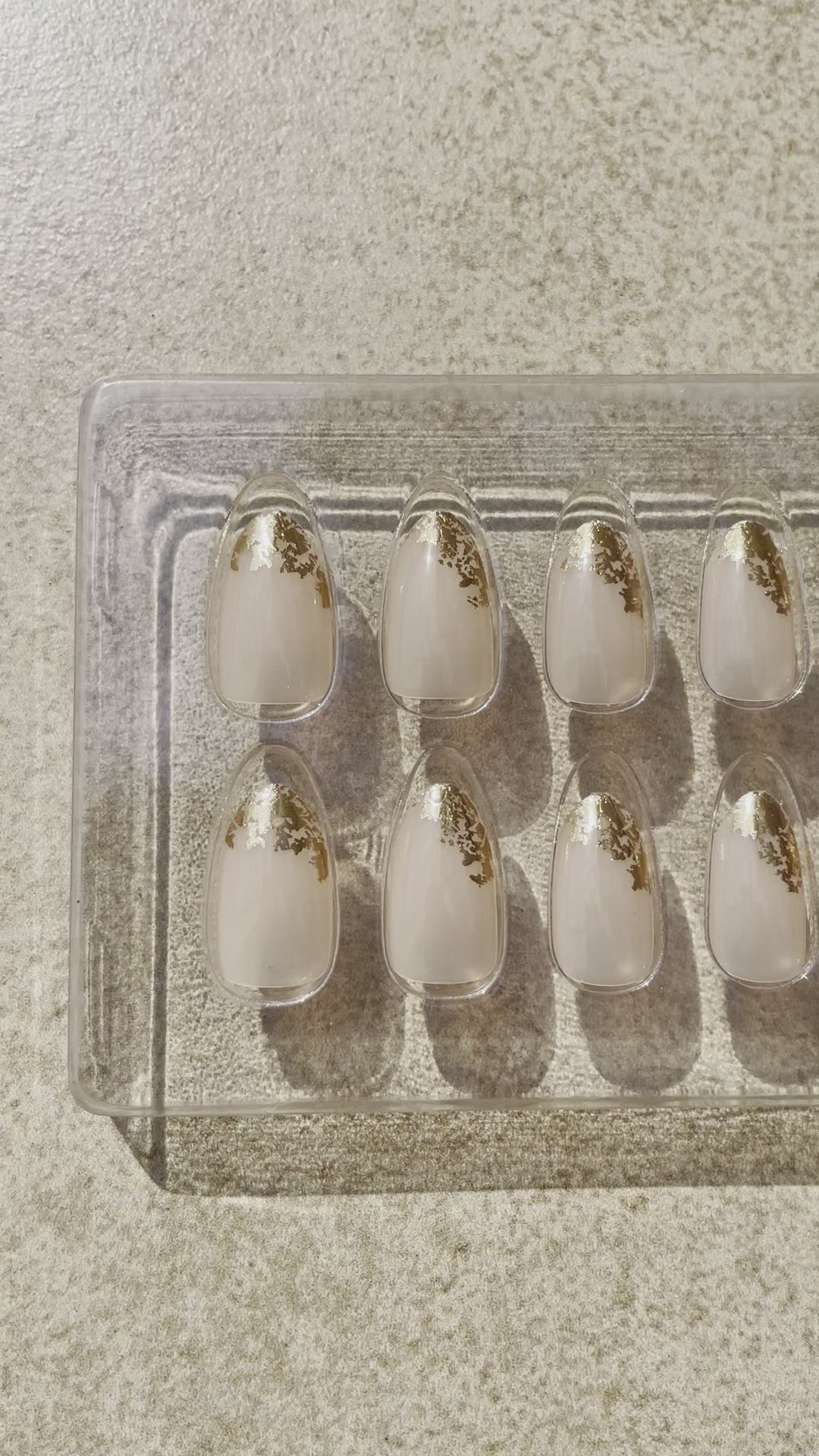 Short Nude colored gold tip Goddess Almond press-on nails made by Leewa Beauty