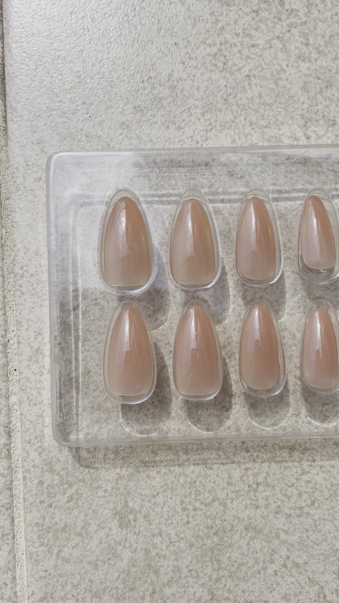 Reusable medium almond press-on nails made from soft gel with a beautiful nude-brown hue. Name of name is called Spice Almond sold by Leewa Beauty