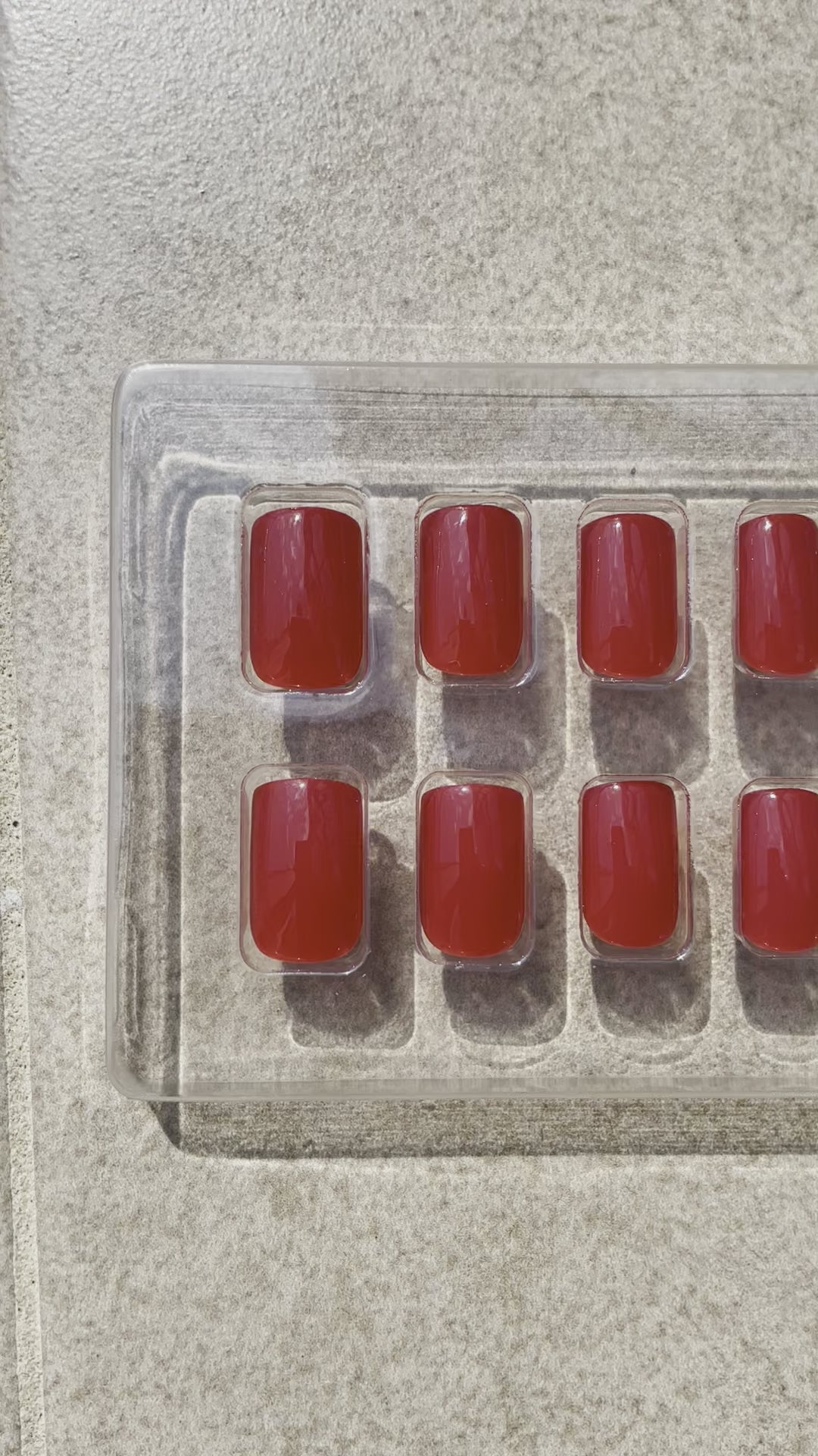 Reusable Short Red Square Press-on Nails in vibrant red. Nails are called Ruby Square and are made by Leewa Beauty