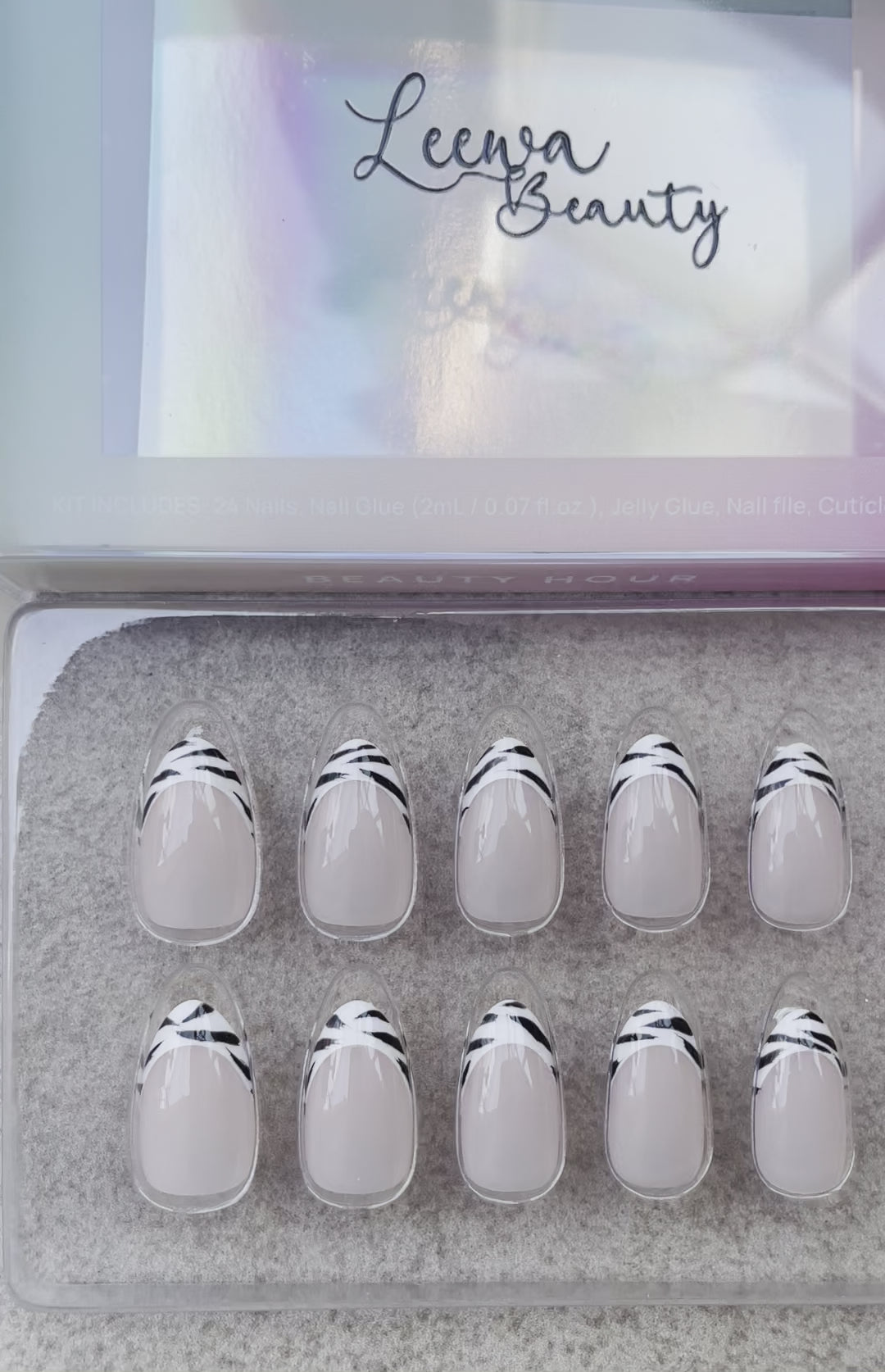 Short Almond Nude color Press-on nails with French Zebra design made by Leewa Beauty