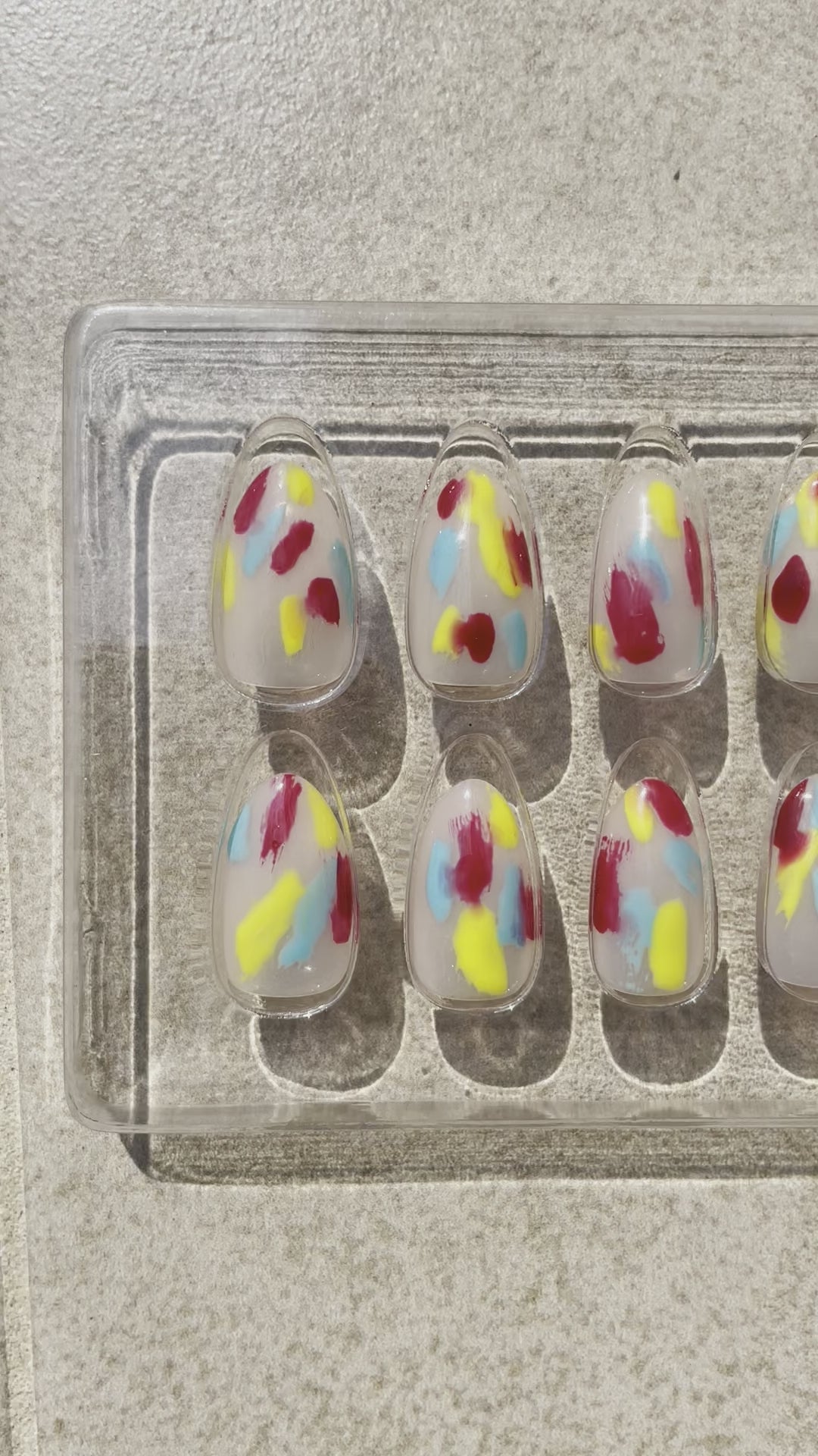 Short Colorful yellow, blue, red Jazzy Almond press-on nails made by Leewa Beauty