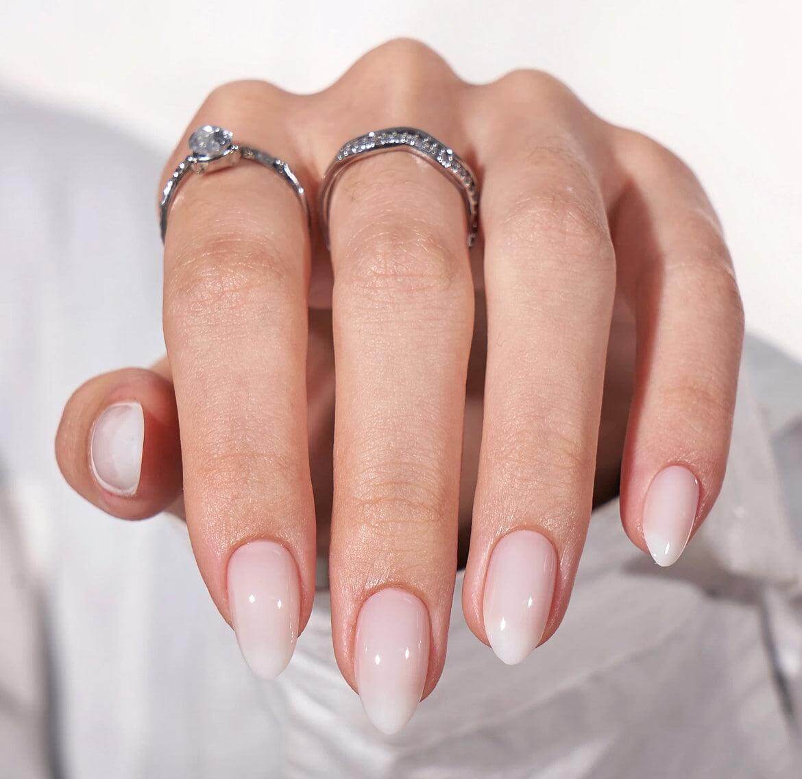 white almond nails with design