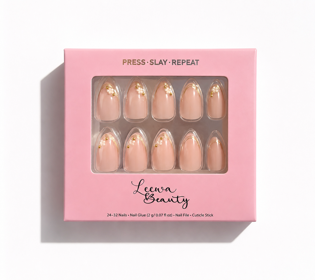 Camellia soft gel almond press-on nails in Leewa Beauty pink packaging with nude pink nails, gold French tips, and floral accent. 