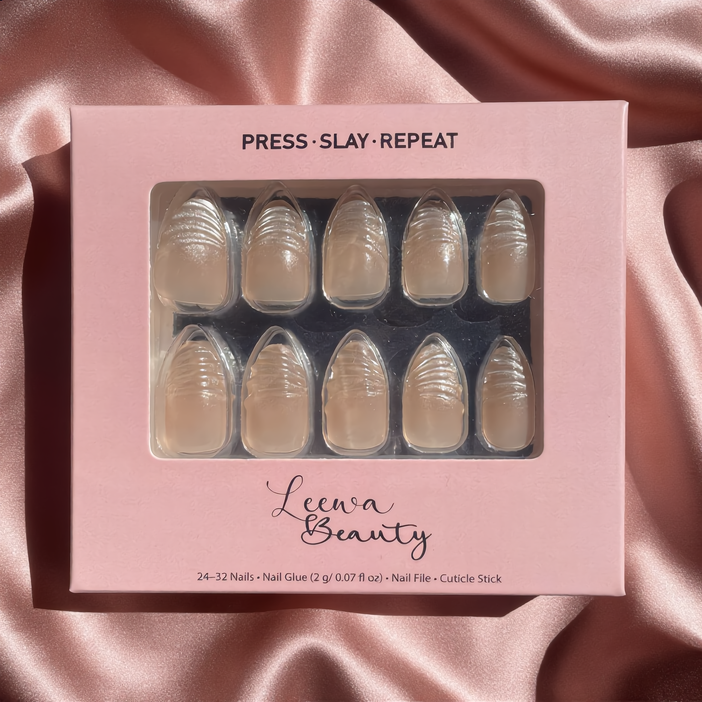 Lumina pearl shell almond soft gel press-on nails in Leewa Beauty pink packaging. 