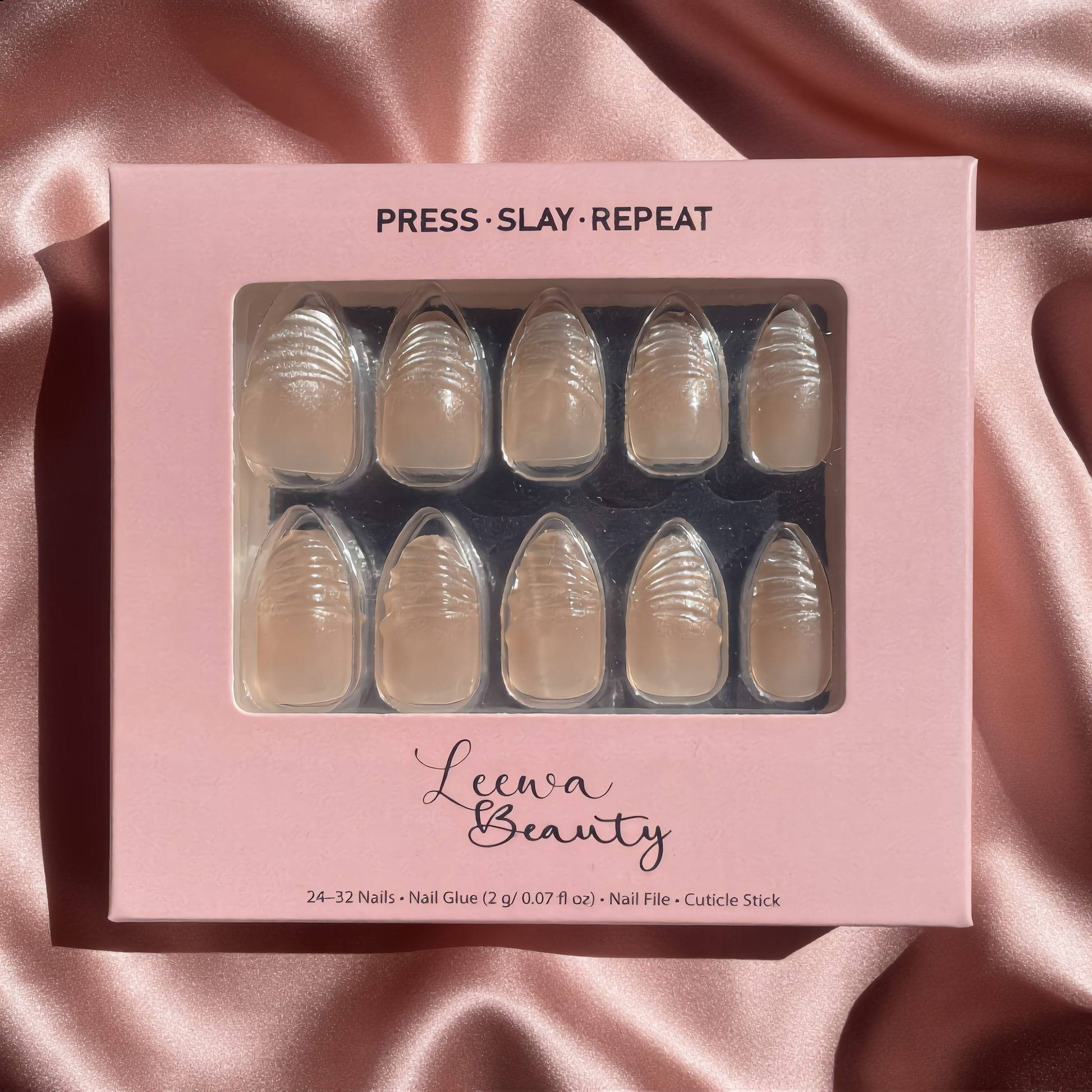 Lumina pearl shell almond soft gel press-on nails in Leewa Beauty pink packaging. 