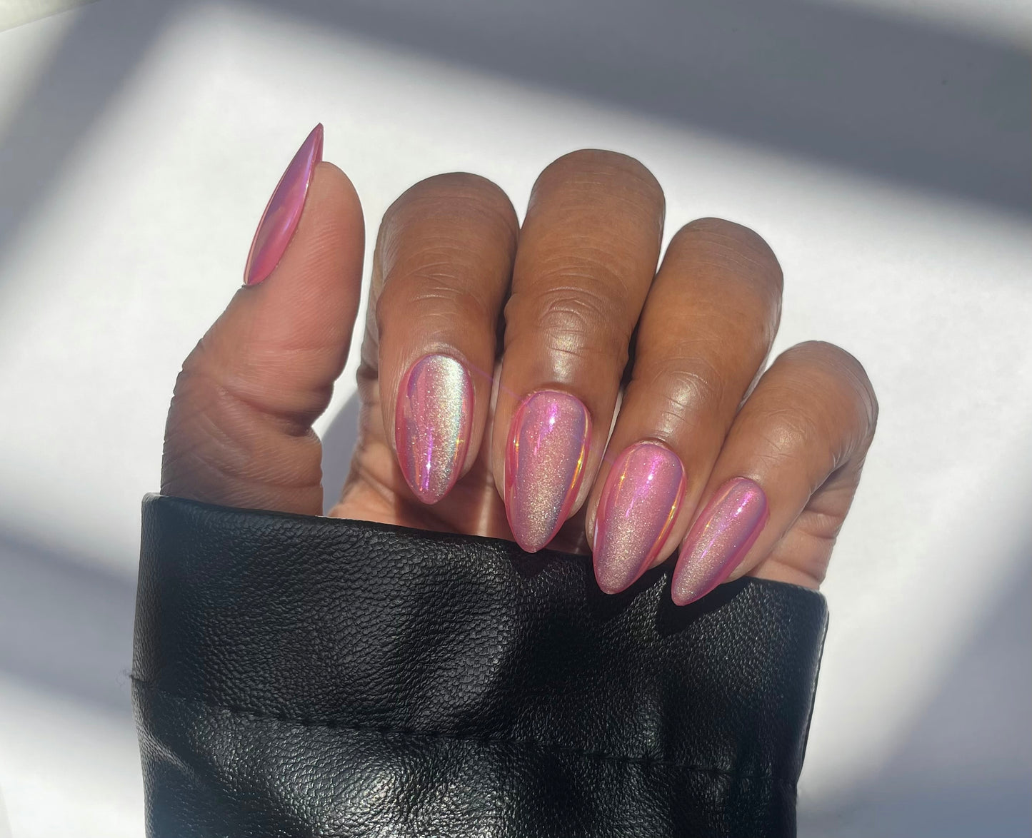Pink chrome soft gel almond press-on nails by Leewa Beauty
