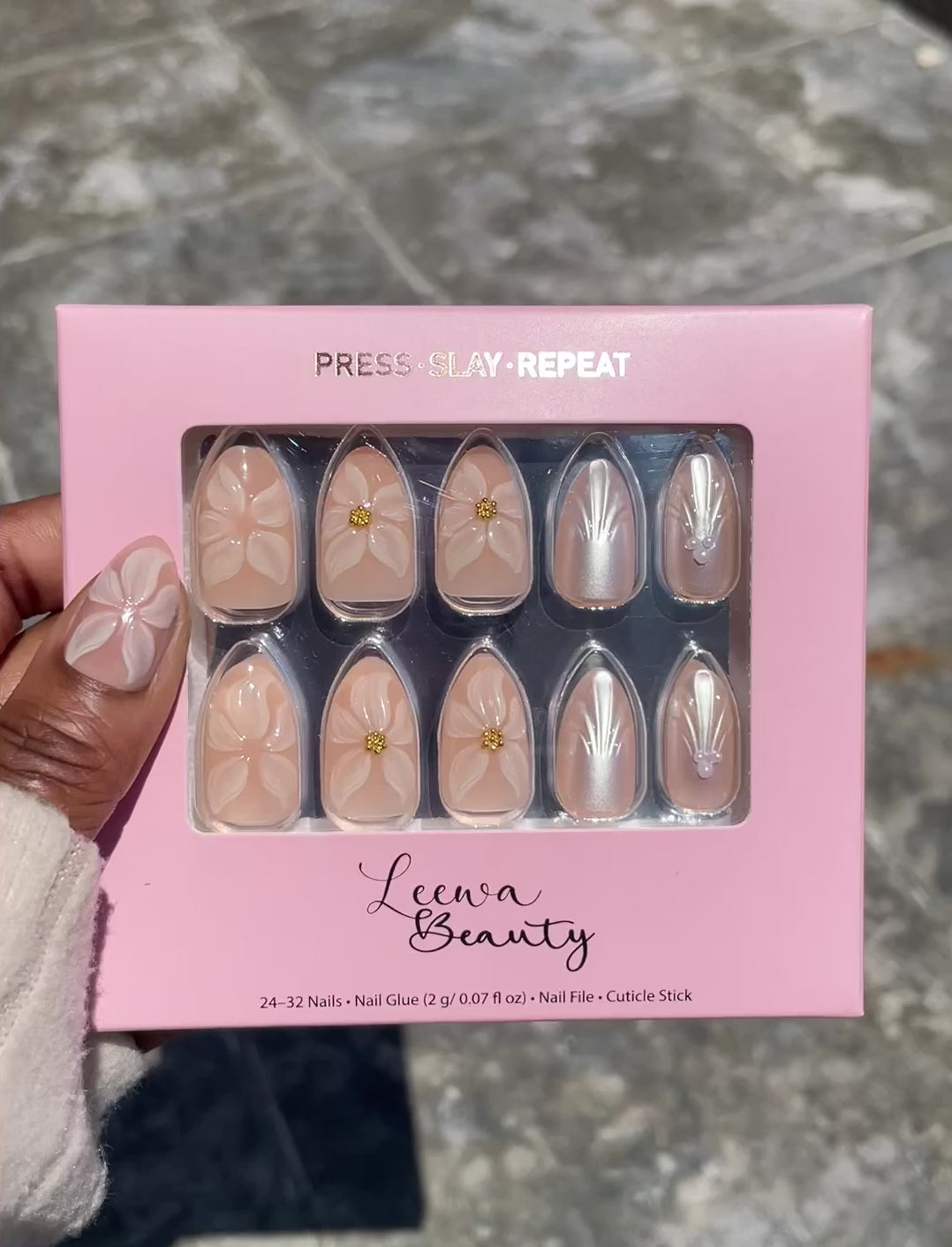 Video of Golden Bloom press-on nails with pearl draped texture, 3D pearl flower and gold foil pinky accent in Leewa Beauty press-on nail brand box– Leewa Beauty

