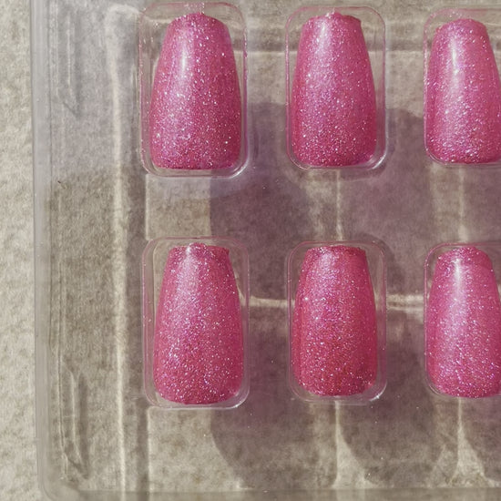 Short Pink Shimmery Reflective Drama Queen Coffin press-on nails made by Leewa Beauty 