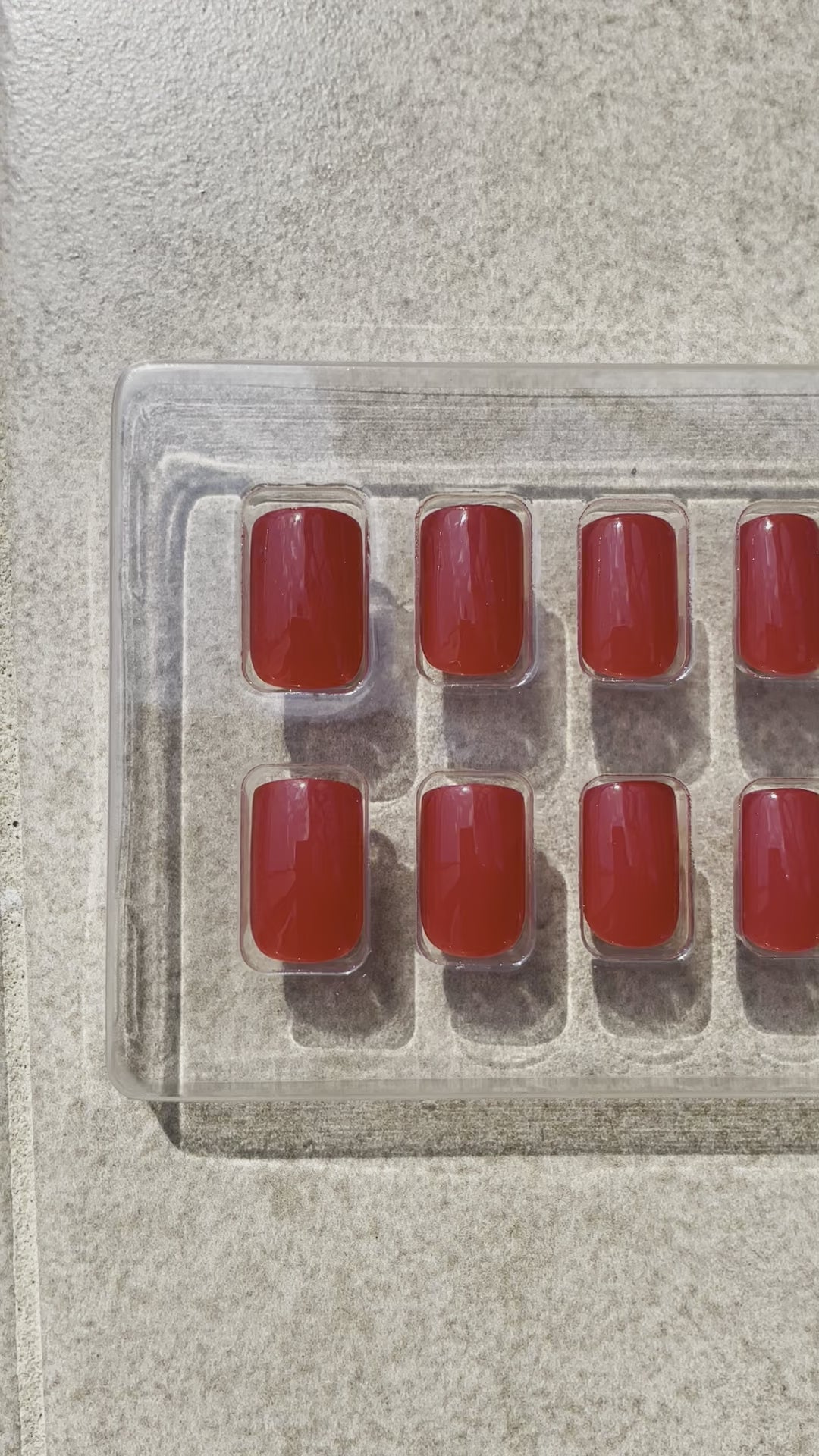 Reusable Short Red Square Press-on Nails in vibrant red. Nails are called Ruby Square and are made by Leewa Beauty 
